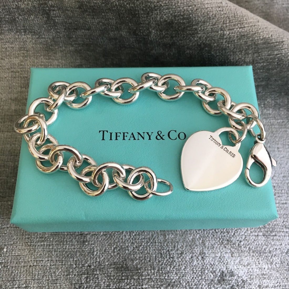 TIFFANY & CO. HEART TAG CHARM BRACELET IN STERLING SILVER W/ BOX & POUCH    Marked, 'TIFFANY & (1 of 5)