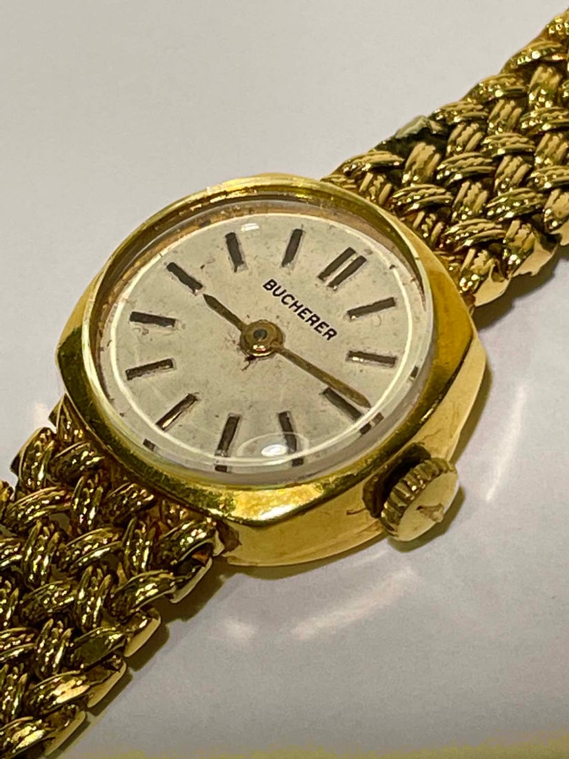 18K GOLD BUCHERER BASKET WEAVE BRACELET LADIES WATCH A Stunning Vintage Ladies 18K Yellow Gold: 18K GOLD BUCHERER BASKET WEAVE BRACELET LADIES WATCHA Stunning Vintage Ladies 18K Yellow Gold BUCHERER Basket Weave Bracelet Watch, with a 17 jewel Swiss mechanical movement, signed case back stamped,