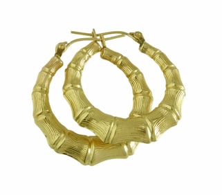 10K YELLOW GOLD GRADUATED BAMBOO HOOP EARRINGS   Marked '10K' with fine lines and and size this