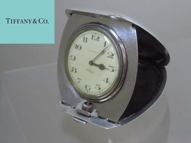 A VINTAGE TIFFANY STERLING SILVER CLAM SHELL 8 DAY ALARM CLOCK   A nice vintage working Tiffany &