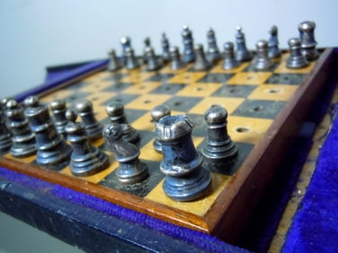 COLLINS COOK EDWARDIAN STERLING SILVER TRAVEL CHESS SET    A rare diminutive Edwardian C1906