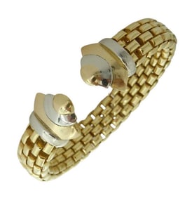 A CHUNKY TWO TONE 18K GOLD CUFF BRACELET 56.8 GRAMS MARKED 750