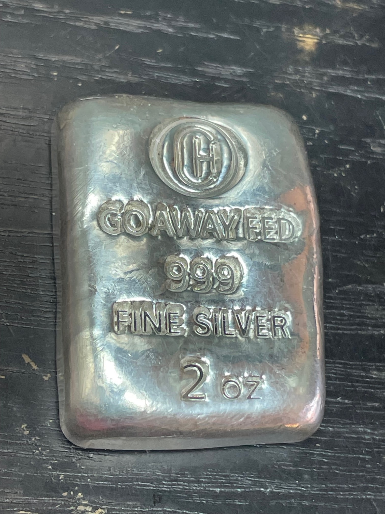 GO AWAY FED .999 FINE SILVER 2 OZ CHUNKY POURED LOAF BULLION INGOT BAR Other Notes: Kotler's: GO AWAY FED .999 FINE SILVER 2 OZ CHUNKY POURED LOAF BULLION INGOT BAR Other Notes: Kotler's Auction Gallery can arrange shipping for this item.