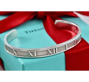 TIFFANY & Co. ATLAS MENS UNISEX SMALL SILVER ROMAN NUMERAL NARROW CUFF BRACELET   Marked 'TIFFANY &