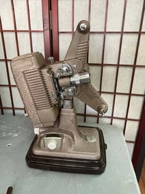REVERE CAMERA COMPANY MODEL P-90 8MM HOME MOVIE FILM PROJECTOR   In excellent working condition,