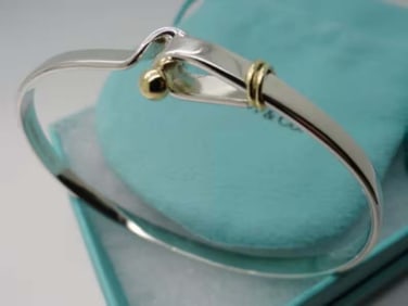 18Kt GOLD & STERLING SILVER TIFFANY & CO EYE HOOK TENSION BANGLE BRACELET   Marked, 'TIFFANY & Co.