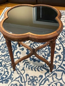HAND CARVED OAK FOUR LEAF CLOVER SIDE TABLE WITH BLACK MIRROR GLASS TOP    A stunning Hand Carved