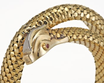 STYLE OF DAVID WEBB 18K YELLOW GOLD AND RUBY CHIMERAL BRACELET 45.7 Grams    Mythology meets