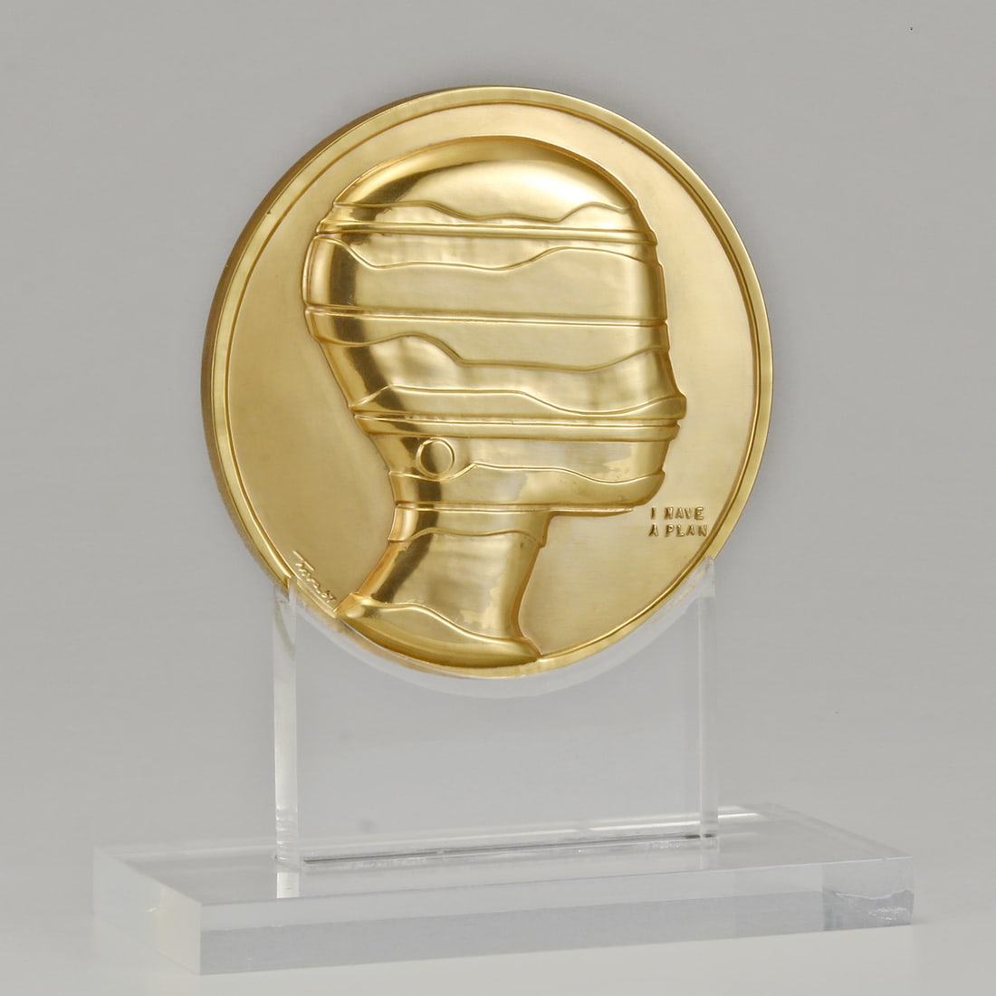 ERNEST TINO TROVA AMERICAN, 1927-2009 MANSCAPE MEDALLION 65/75 Ernest Tino Trova American, 1927: ERNEST TINO TROVA AMERICAN, 1927-2009 MANSCAPE MEDALLION 65/75Ernest Tino Trova American, 1927 - 2009 Manscape Medallion Coin Signed: Trova 67 (obverse) numbered: 65/75 (The Medallic Art Company, New