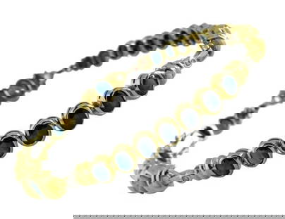 DIAMOND SAPPHIRE 18K YELLOW GOLD FANCY TENNIS BRACELET   A Stunning Vintage 18K Yellow Gold Diamond: DIAMOND SAPPHIRE 18K YELLOW GOLD FANCY TENNIS BRACELETA Stunning Vintage 18K Yellow Gold Diamond & 11.19ct Blue Sapphire Tennis Bracelet, stamped '750', featuring prong set oval sapphires complemented