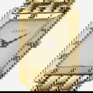 ULTRA THIN GOLD TONE STAINLESS ROMAN BEZEL GUCCI 4200 M SWISS QUARTZ MENS TANK WATCH    With a: ULTRA THIN GOLD TONE STAINLESS ROMAN BEZEL GUCCI 4200 M SWISS QUARTZ MENS TANK WATCH With a Swiss quartz movement, snap back water resistant case back, insignia crown, scratch resistant sapphire cryst
