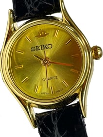 NICE WOMAN'S SEIKO 2906-0400 GOLD TONE CHAMPAGNE STICK DIAL QUARTZ STATEMENT WATCH An outstanding