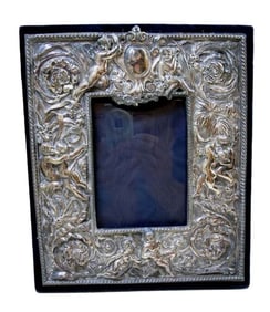 19C VICTORIAN REPOUSSE STERLING SILVER PICTURE FRAME ANGELS PUTI An outstanding antique 19th