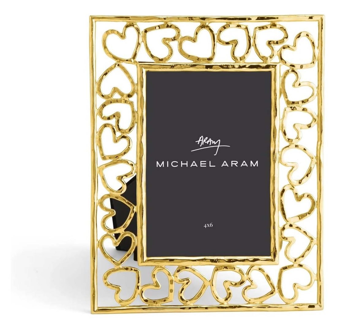 MICHAEL ARAM GOLD HEART & SOUL PICTURE FRAME HOLDS 4X6 PHOTO A Stunning open work design with: MICHAEL ARAM GOLD HEART & SOUL PICTURE FRAME HOLDS 4X6 PHOTOA Stunning open work design with fine lines holds 4x6 inch photos horizontally or vertically. The frame itself measures 9 x 7 inches, is in