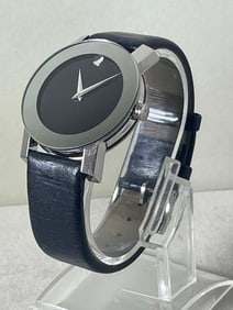 MENS MOVADO 35MM MIRROR 84.G1.1896 BLACK LEATHER STRAP WATCH With a Swiss quartz movement, snap