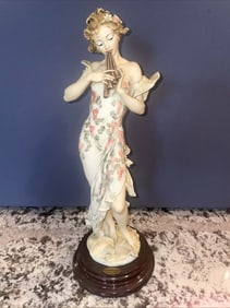 GIUSEPPE ARMANI 1995 MELODY 0656-C PORCELAIN FIGURINE FLUTE PLAYER The product is a medium-sized