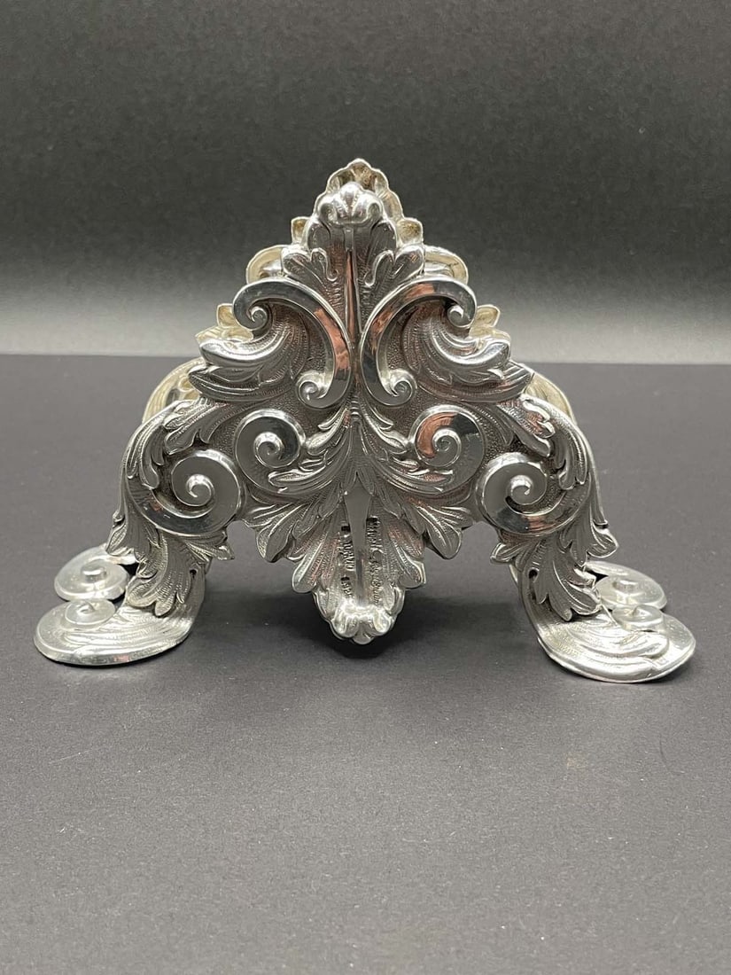 HIGH RELIEF C-SCROLLS AND ACANTHUS LEAF STERLING SILVER NAPKIN HOLDER Marked, 'TAPAZIO 925', with (1 of 8)