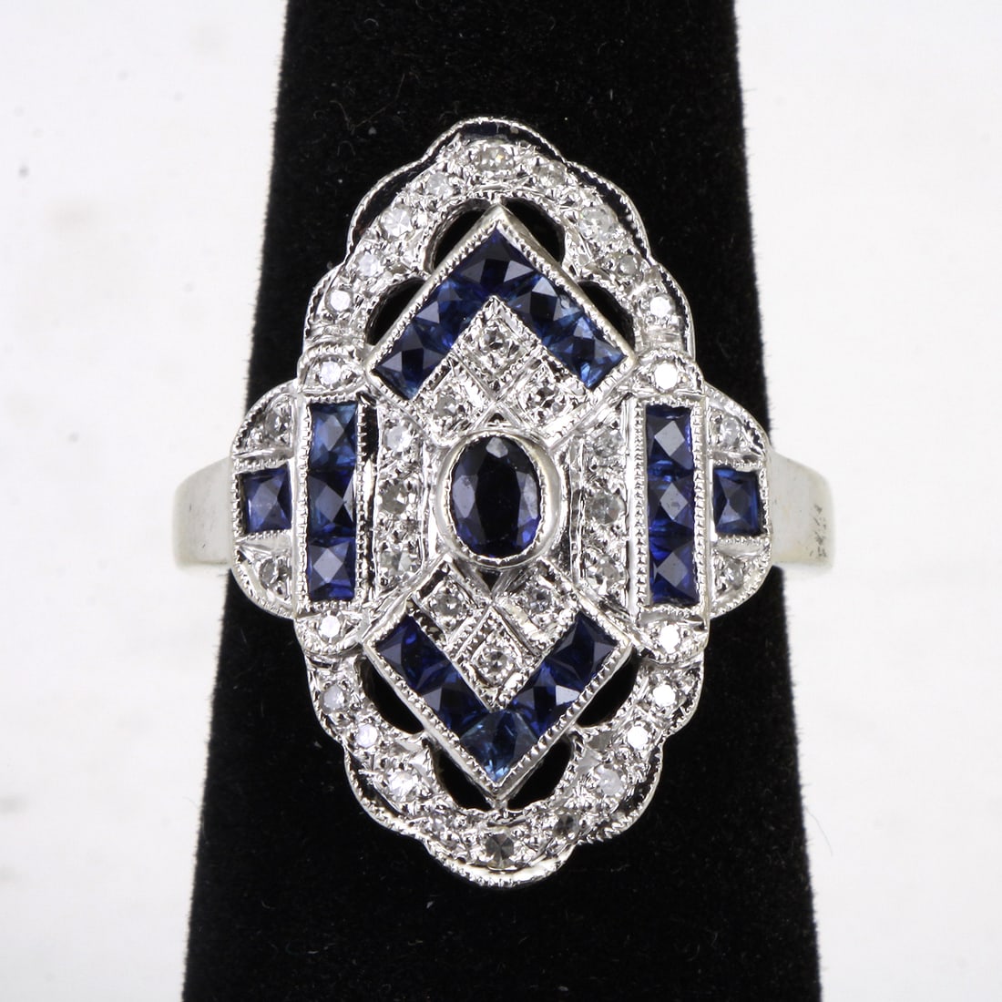 ART DECO STYLE 14KT WHITE GOLD SAPPHIRE & DIAMOND LADIES COCKTAIL RING Crafted in 14kt white: ART DECO STYLE 14KT WHITE GOLD SAPPHIRE & DIAMOND LADIES COCKTAIL RING Crafted in 14kt white gold this art deco style ring is set with single cut diamonds of H-I-J color and VS2-SI1 clarity; accented 