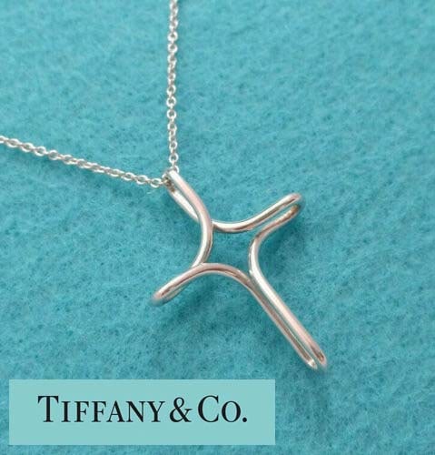 LARGE ELSA PERETTI TIFFANY & Co. STERLING SILVER INFINITY LARGE CROSS PENDANT NECKLACE Marked: LARGE ELSA PERETTI TIFFANY & Co. STERLING SILVER INFINITY LARGE CROSS PENDANT NECKLACE Marked ''Tiffany & Co. PERETTI 925'' on the cross and the chain, comes pre-polished with the Tiffany pouch, box, 