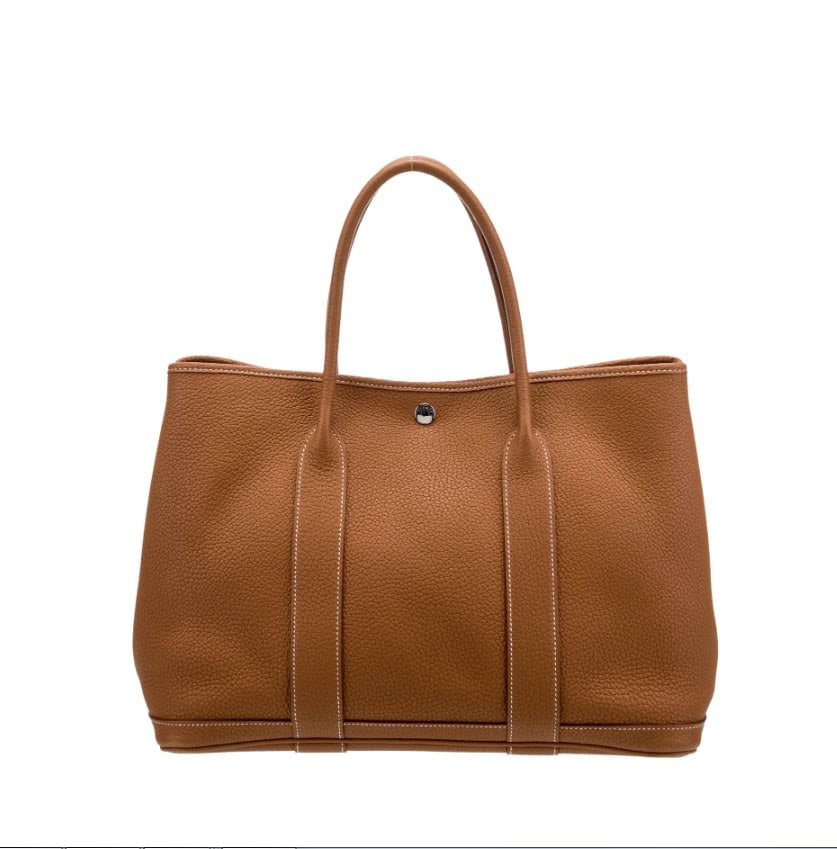 HERMES NEGONDA GARDEN PARTY 36 CALFSKIN TOTE PALLADIUM HARDWARE, Circa 2018 The interior is lined: HERMES NEGONDA GARDEN PARTY 36 CALFSKIN TOTE PALLADIUM HARDWARE, Circa 2018 The interior is lined in supple chevron or herringbone textile material. PLEASE NOTE: Hardware: Palladium Serial number: AM 