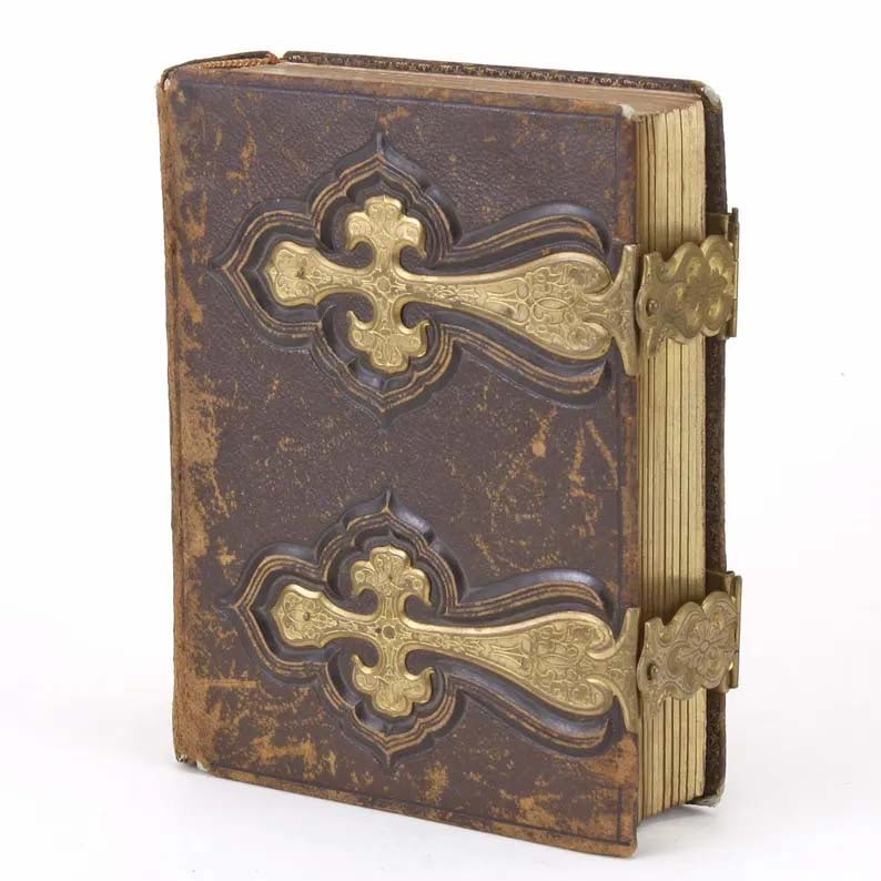 LATE 19TH CENTURY CARTE DE VISITE LEATHER PHOTO ALBUM GOTHIC REVIVAL Late 19th century Carte de: LATE 19TH CENTURY CARTE DE VISITE LEATHER PHOTO ALBUM GOTHIC REVIVAL Late 19th century Carte de Visite photo album. Of rectangular form, featuring ornately tooled leather, gothic revival brass fitting
