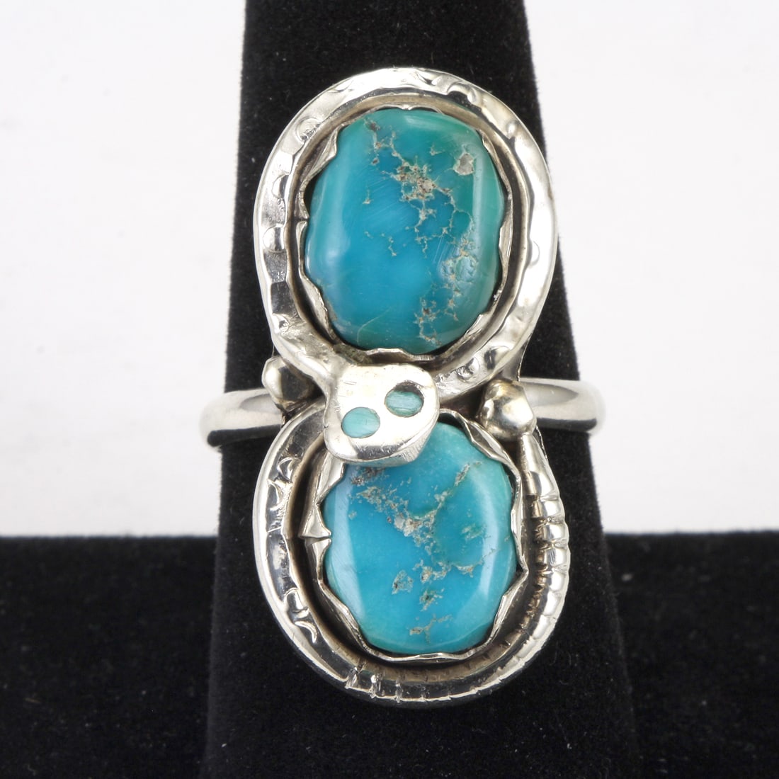 STERLING SILVER TURQUOISE NATIVE AMERICAN INFINITY SIZE 9.5 ZUNI SNAKE RING BY EFFIE CALAVAZA: STERLING SILVER TURQUOISE NATIVE AMERICAN INFINITY SIZE 9.5 ZUNI SNAKE RING BY EFFIE CALAVAZA Effie Calavaza's original men's size 9.5 snake ring features a striking combination of turquoise and silve