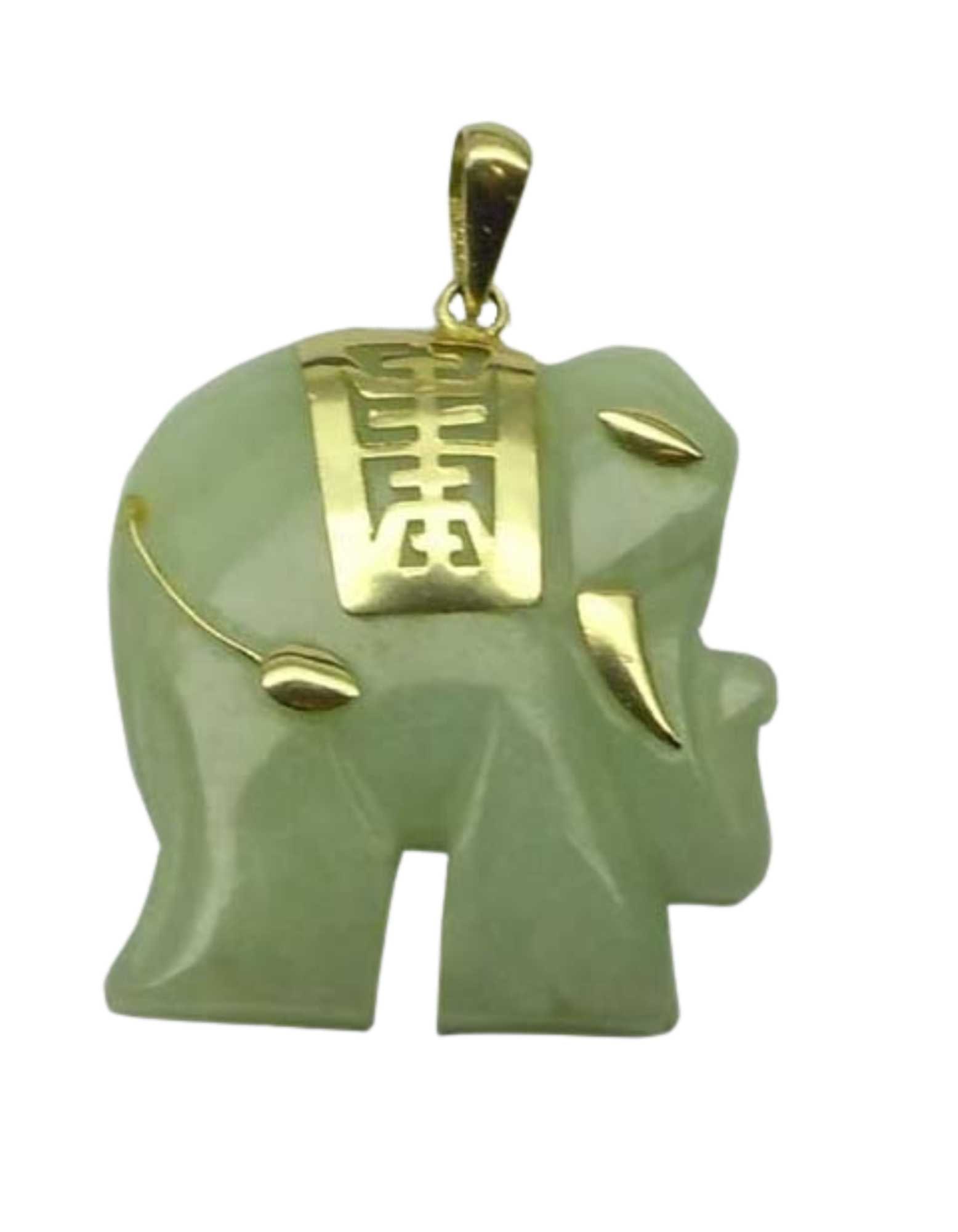 TRUNK UP GOOD LUCK JADE ELEPHANT WITH 10K YELLOW GOLD ACCENTS PENDANT DETAILS: - MARKED: 10K -: TRUNK UP GOOD LUCK JADE ELEPHANT WITH 10K YELLOW GOLD ACCENTS PENDANT DETAILS: - MARKED: 10K - SIZE: 1-3/8 In. Height (with bale) 1 In. Width. - BALE: Fits 2.5 mm. Diameter Necklace. - WEIGHT: 5.8 Gra