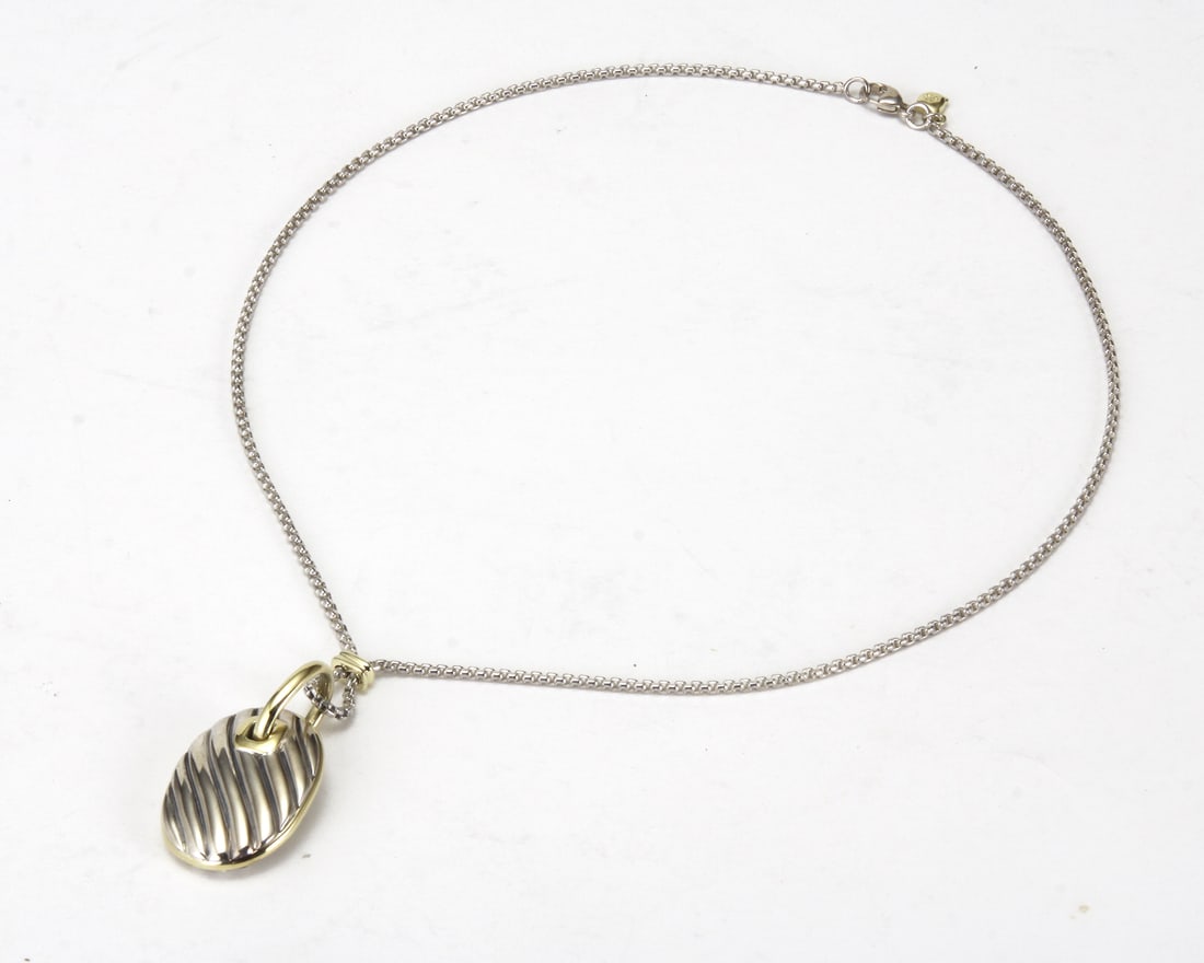 DAVID YURMAN TWO-TONE STERLING SILVER & 18K YELLOW GOLD SCULPTED CABLE PENDANT NECKLACE Marked,: DAVID YURMAN TWO-TONE STERLING SILVER & 18K YELLOW GOLD SCULPTED CABLE PENDANT NECKLACE Marked, ''DY 925 750''. Comes pre-polished with David Yurman pouch. DETAILS: - NECKLACE SIZE: 16 In. Length - PE