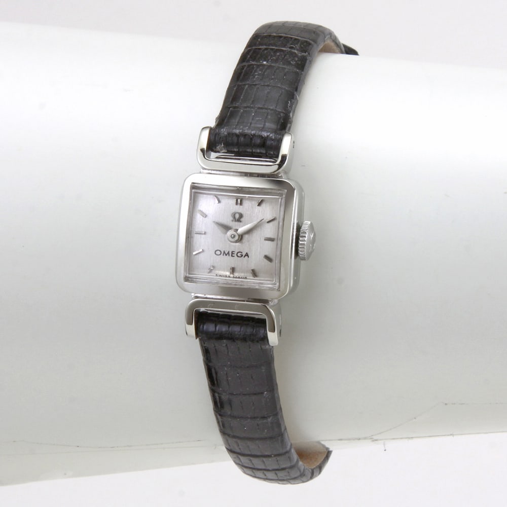 18KT WHITE GOLD OMEGA 10516-2 MANUAL WIND LADIES Cal 483 WATCH w/ Sleek Straight Lugs, Circa 1959: 18KT WHITE GOLD OMEGA 10516-2 MANUAL WIND LADIES Cal 483 WATCH w/ Sleek Straight Lugs, Circa 1959 DETAILS: Brand: Omega Ref: 10516-2 Model: Manual Wind Movement number: 17693404 Year: Circa 1959 Gende