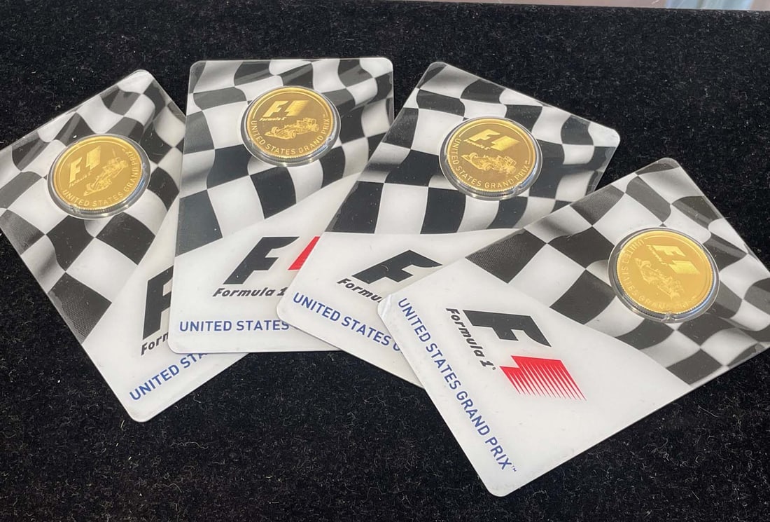 FOUR (4) UNITED STATED GRAND PRIX 1/4oz GOLD PROOF COLLECTORS COIN by PAMP SUSSIE DETAILS: -: FOUR (4) UNITED STATED GRAND PRIX 1/4oz GOLD PROOF COLLECTORS COIN by PAMP SUSSIE DETAILS: - WEIGHT: 1/4 ozt .999 Gold (each) - TOTAL WEIGHT: 1 ozt Other Notes: Kotler's Auction Gallery can arrange sh