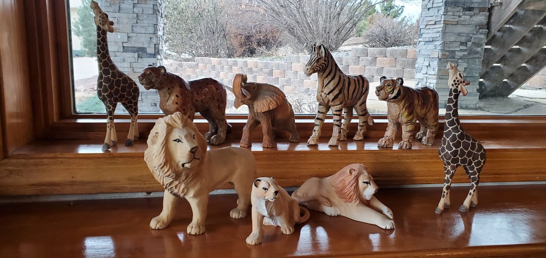 Hand-carved Wood Safari Animals x9 Lot: Hand-carved Wood Safari Animals x9 Lot: Giraffe x2, Spotted Leopard, Elephant, Zebra, Tiger and Lions x3.