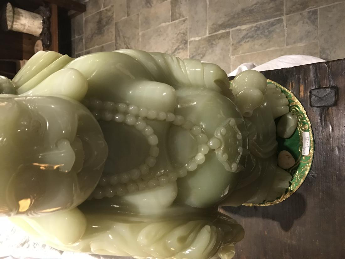 green hardstone figure of a buddha (1 of 2)