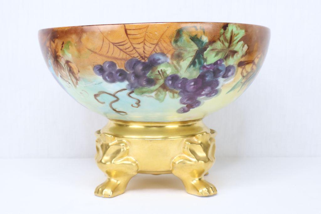 Porcelain Bowl And Stand, Hand Painted Grape Vines And Spider Web, Gold Gilt, 12"X8", Signed By The: Porcelain Bowl And Stand, Hand Painted Grape Vines And Spider Web, Gold Gilt, 12"X8", Signed By The Artist Estimate $10-100