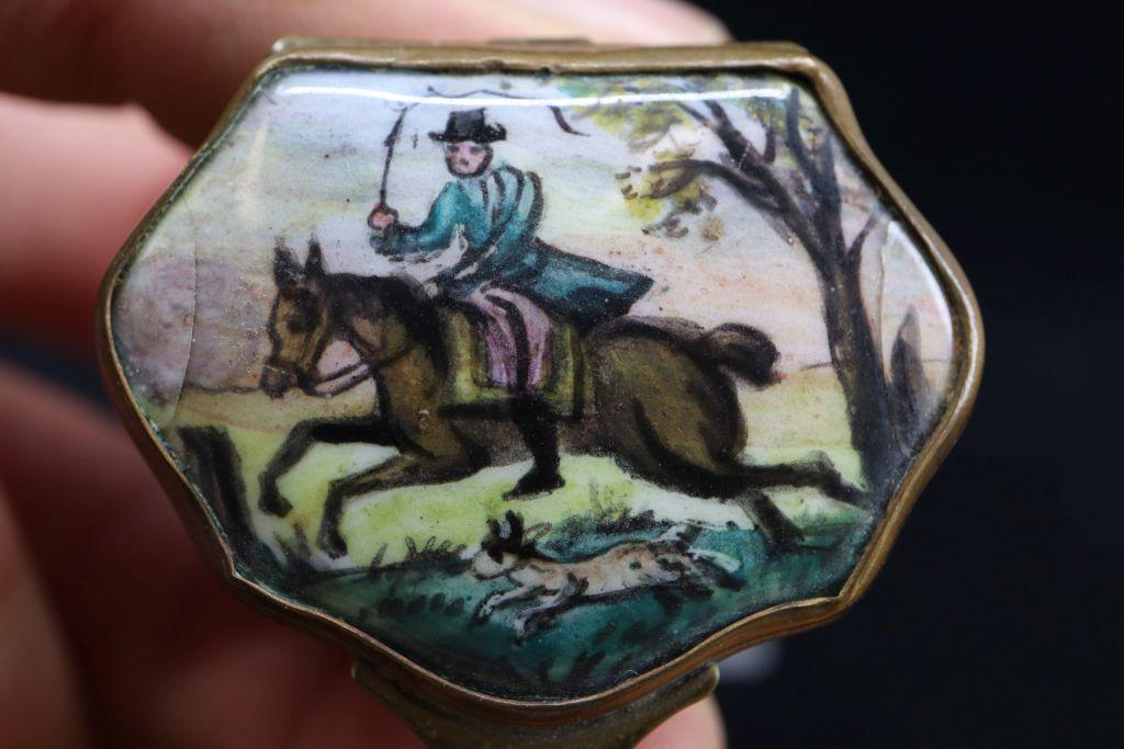Enamel Painted Porcelain Snuff Box, Horse And Rider In Chase, 1.75"L, Two Cracks To Lid: Enamel Painted Porcelain Snuff Box, Horse And Rider In Chase, 1.75"L, Two Cracks To Lid Estimate $10-100