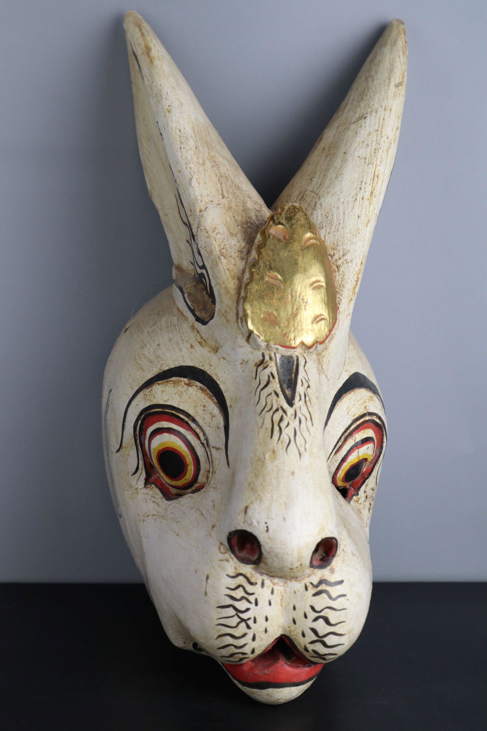 INDONESIAN PAINTED AND CARVED WOODEN HARE HEAD MASK WALL DECORATION, 13.5X6"H: Indonesian Painted And Carved Wooden Hare Head Mask Wall Decoration, 13.5X6"H