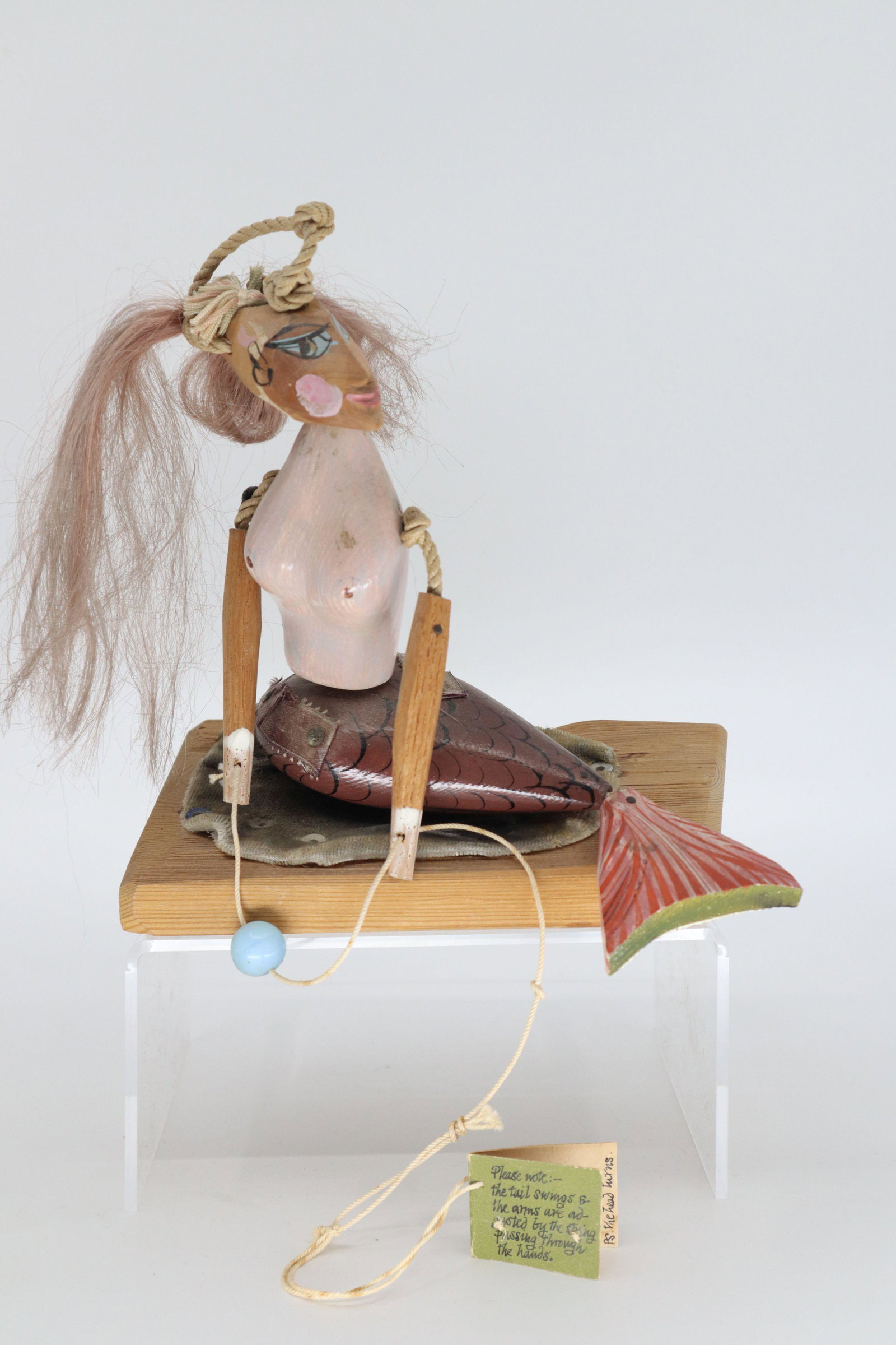 FOLK ART MERMAID SCULPTURE, TAG SAYS "GENUINE MERMAID SEATED ON A ROCK, SAM SMITH, ENGLAND", 6X6: Folk Art Mermaid Sculpture, Tag Says "Genuine Mermaid Seated On A Rock, Sam Smith, England", 6X6