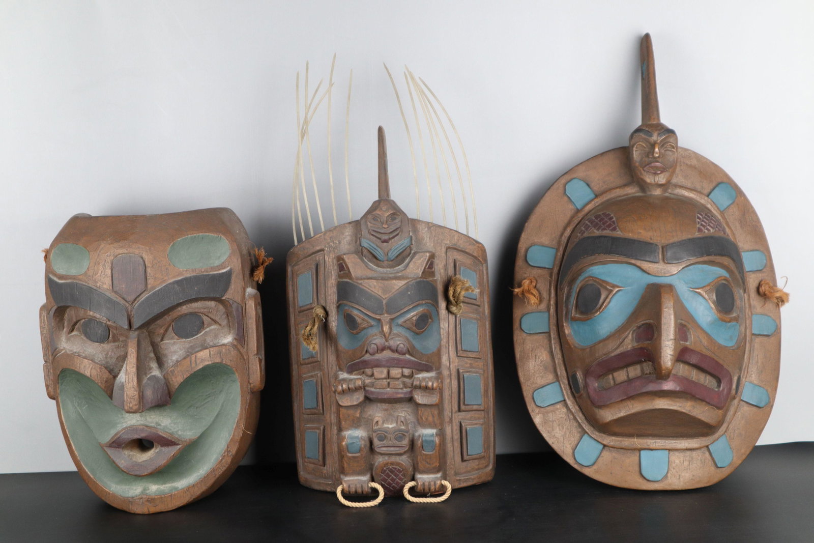 3 PHILIP THORN REPRODUCTION PACIFIC NORTHWEST NATIVE MASKS, MADE WITH MOLDED WOOD PULP: 3 Reproduction Pacific Northwest Native Masks, Largest Is 9X15.25X5.5", Made With Molded Wood Pulp, Philip Thorn.