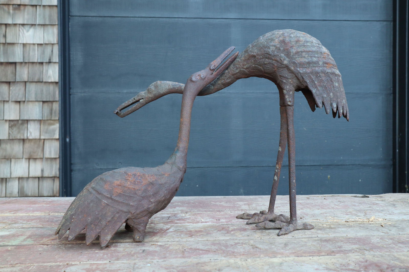 2 CAST IRON CRANES, 16X13"(LARGEST) NO LEGS FOR THE SMALLER ONE.: 2 Cast Iron Cranes, 16X13"(Largest) No Legs For The Smaller One.