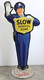 COCA COLA POLICEMAN SLOW SCHOOL ZONE SIGN, 30X63"H, CAST IRON BASE 22", MARKED AM 92, "SLOW SCHOOL