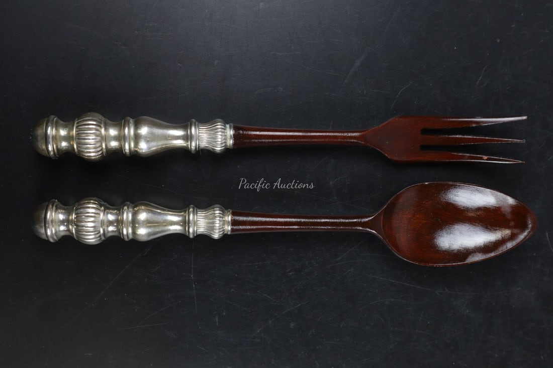 HALLMARK STERLING SILVER AND WOOD SALAD SERVERS, 11": DESCRIPTION: HALLMARK STERLING SILVER AND WOOD SALAD SERVERS, 11" WEIGHT: CONDITION: Please see photos for condition. Condition is commensurate with age and use. We aim to take additional photos of an