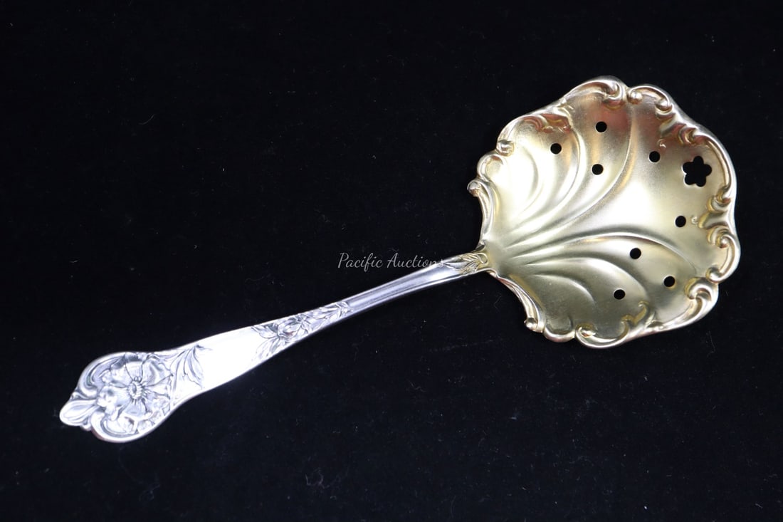 FS GILBERT PIERCED STERLING SILVER BON BON SPOON WITH GOLD WASH, 1910, 5-1/2": DESCRIPTION: FS GILBERT PIERCED STERLING SILVER BON BON SPOON WITH GOLD WASH, 1910, 5-1/2" WEIGHT: CONDITION: Please see photos for condition. Condition is commensurate with age and use. We aim to tak