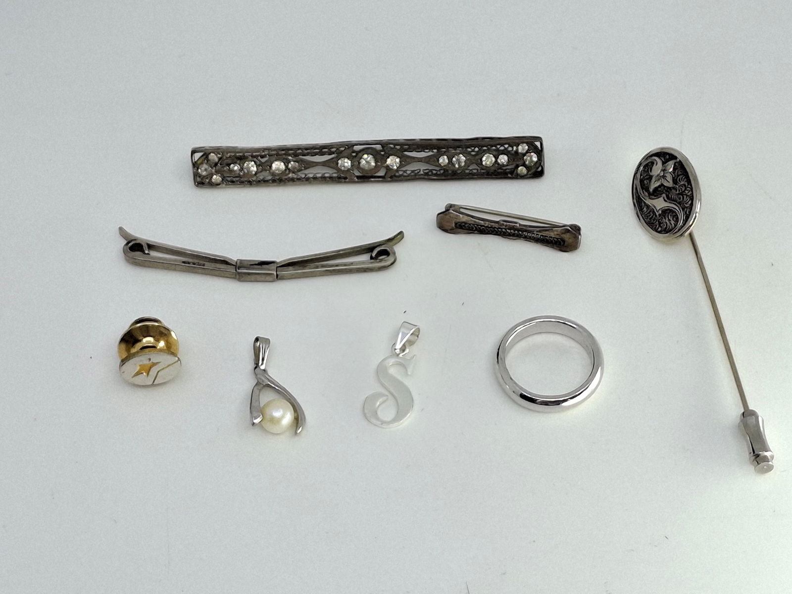 ASSORTED STERLING PINS AND CHARMS (1 of 2)