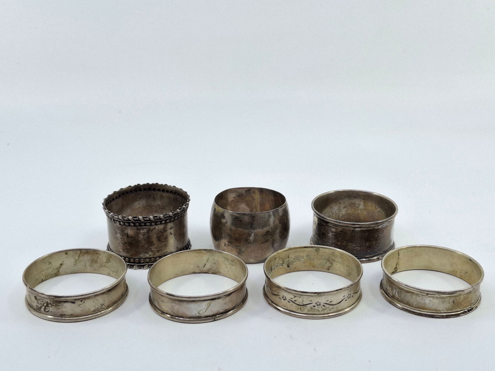 STERLING SILVER NAPKIN RINGS, 76 G TOTAL, LULLABY 1929, GORHAM 6290, UNMARKED.: DESCRIPTION: STERLING SILVER NAPKIN RINGS, 76 G TOTAL, LULLABY 1929, GORHAM 6290, UNMARKED.. CONDITION: Please See Photos For Condition. Condition Is Commensurate With Age And Use. We Aim To Take Addi
