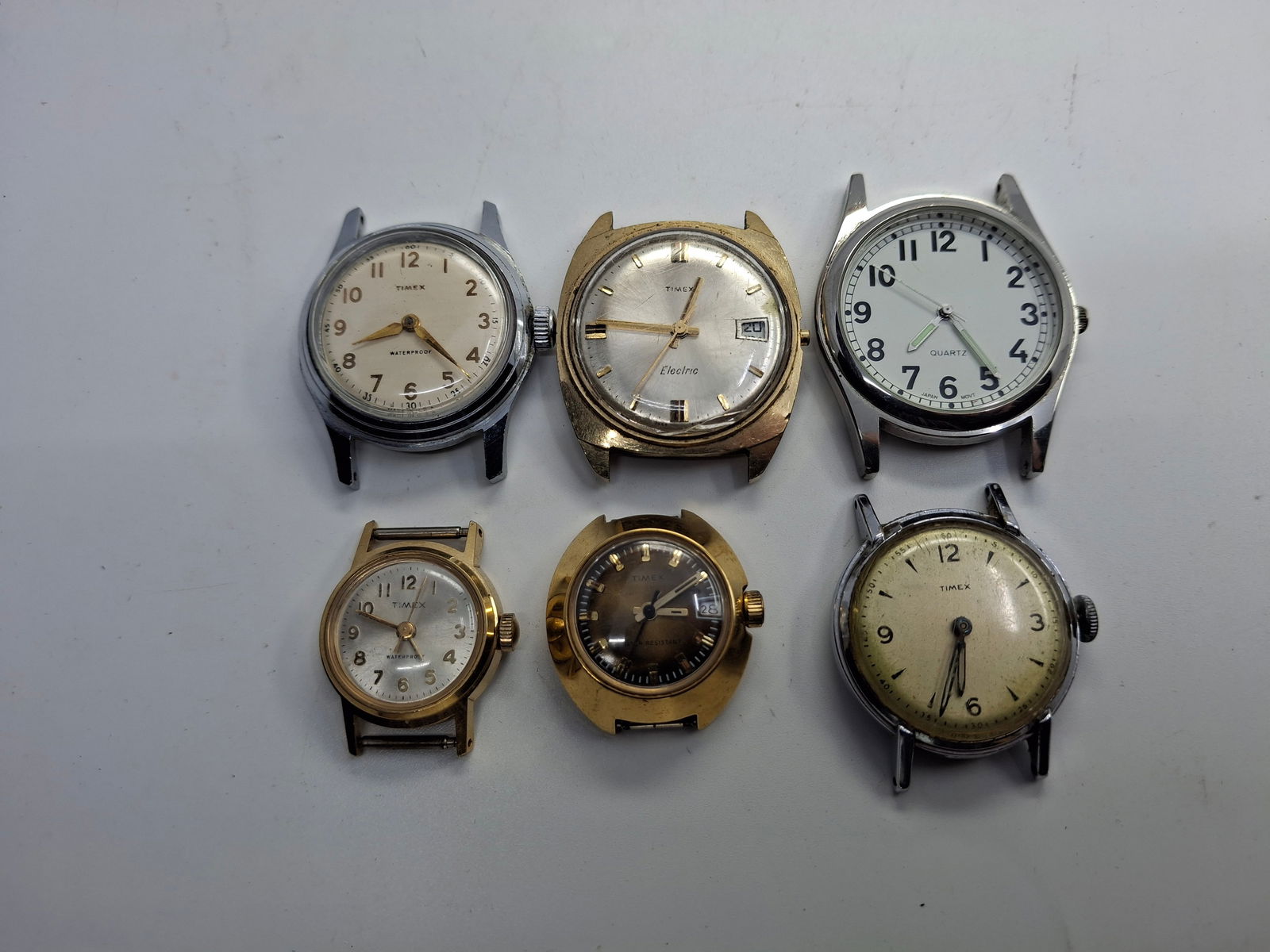 GROUP OF 6) TIMEX WATCHES, ONE JAPAN MOVEMENT: DESCRIPTION: GROUP OF 6) TIMEX WATCHES, ONE JAPAN MOVEMENT. CONDITION: Please See Photos For Condition. Condition Is Commensurate With Age And Use. We Aim To Take Additional Photos Of Any Noticeable D