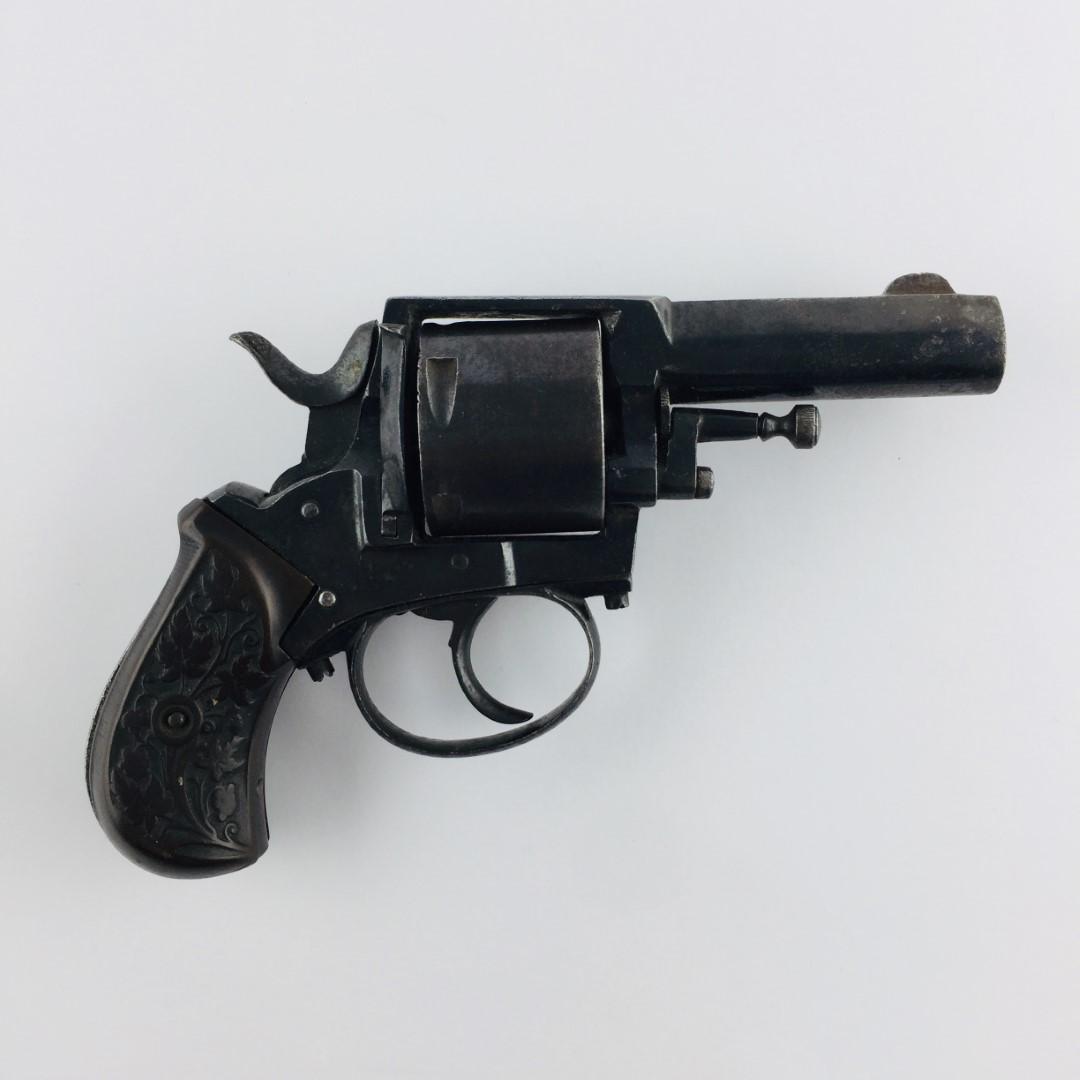 Revolver: Belgian British Bulldog revolver. Bluing. Brown bakelite handles decorated with "leaves and flowers". Working. PLEASE CONTACT US BEFORE BIDDING ON A FIREARM SO THAT WE CAN ESTABLISH ITS SHIPPING COST.