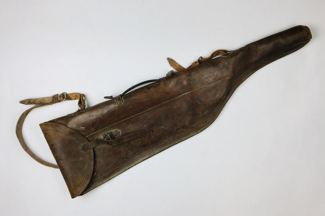 Hard case for shotgun: Brown leather shotgun case. Estuche para escopeta en cuero marrÃ³n.
