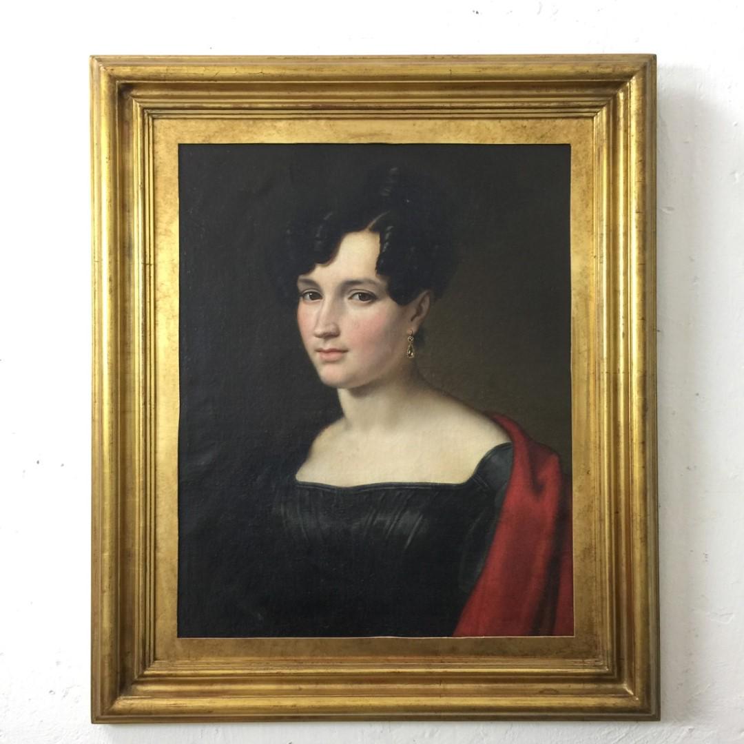 Oil on canvas. "Portrait": Anonymous painting XIX century. Oil on canvas. "Portrait of a young lady with a punctured coat". 61 x 50 cm. Cuadro anónimo siglo XIX. Óleo sobre tela. "Retrato de joven dama con abrigo colo