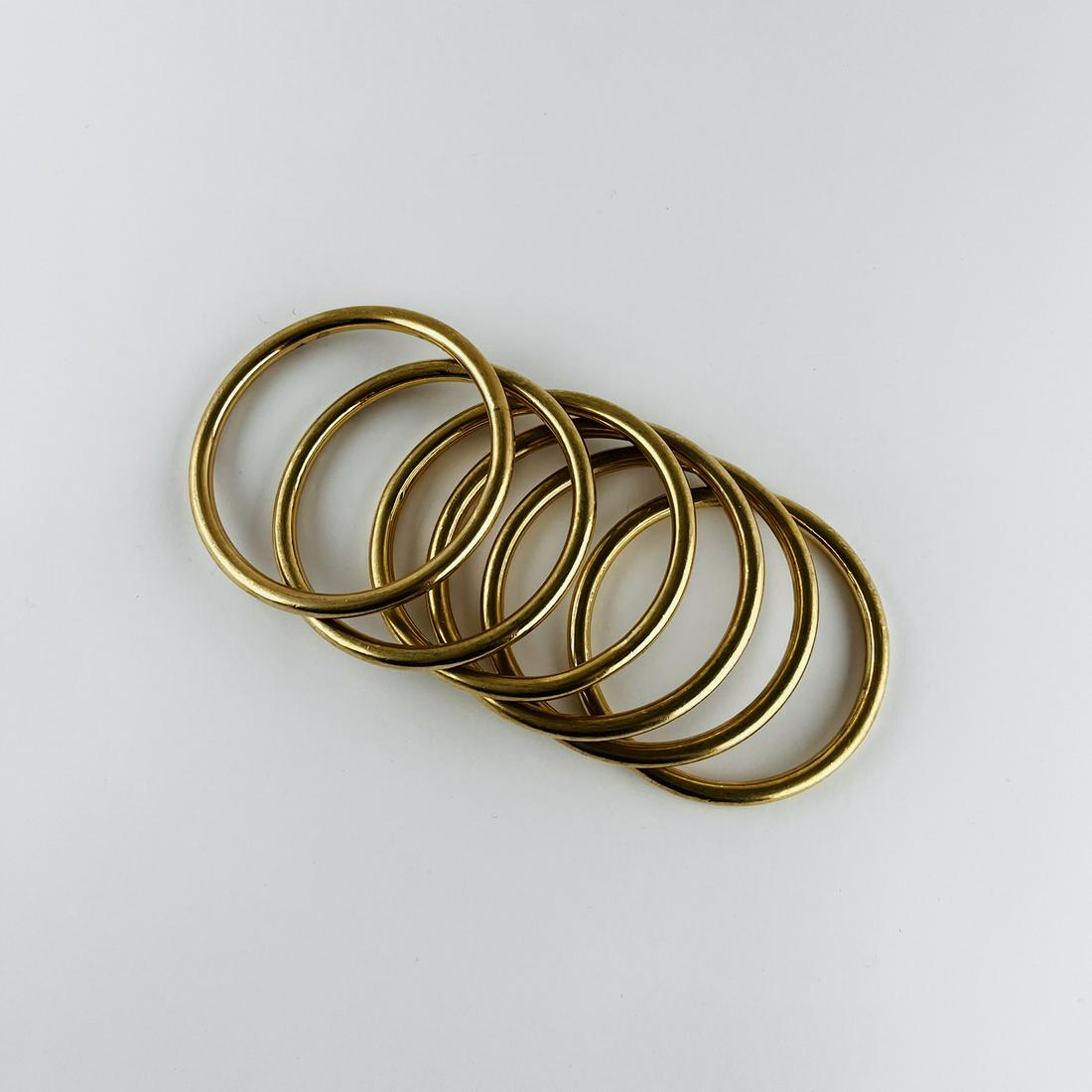 Six 12k yellow gold plated wrist rings (1 of 1)