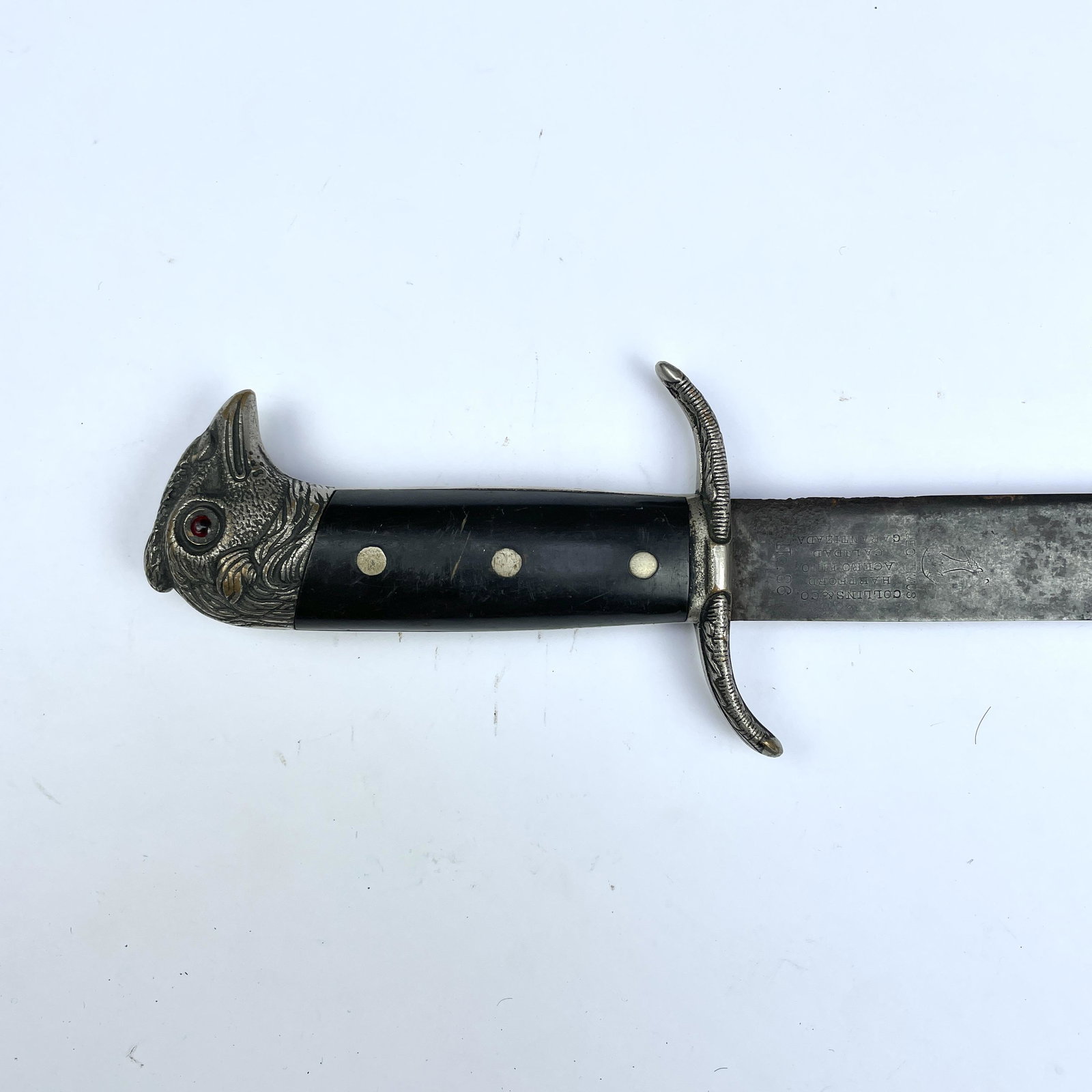 USA machete: American machete manufactured by Collins & Co., used by the Cuban Army in the Cuban war of independence in 1895. Silver metal handle, with sculptured "eagle head" pommel and guampa handles. Length