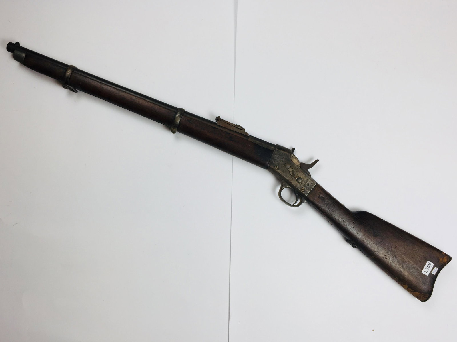 Remington Rolling Block rifle NOT FOR EXPORT: NOT FOR EXPORT Remington Rolling Block rifle transformed into a carbine, caliber 11 mm Argentine "patria" model. Barrel marked "Argentine Model 1876 E.N.". Woking.Fusil Remington Rolling Block transfo